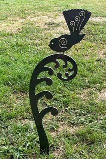 Fantail Koru on Frond